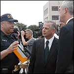 Gene Green is a FARSE! He votes in favor of allowing ILLEGAL ALIENS having access to our healt care, education, welfare system, etc..etc..et.. while standing in this picture with a US Customs Officer who briefs him on the Port of Houston Security Issues!!!!!